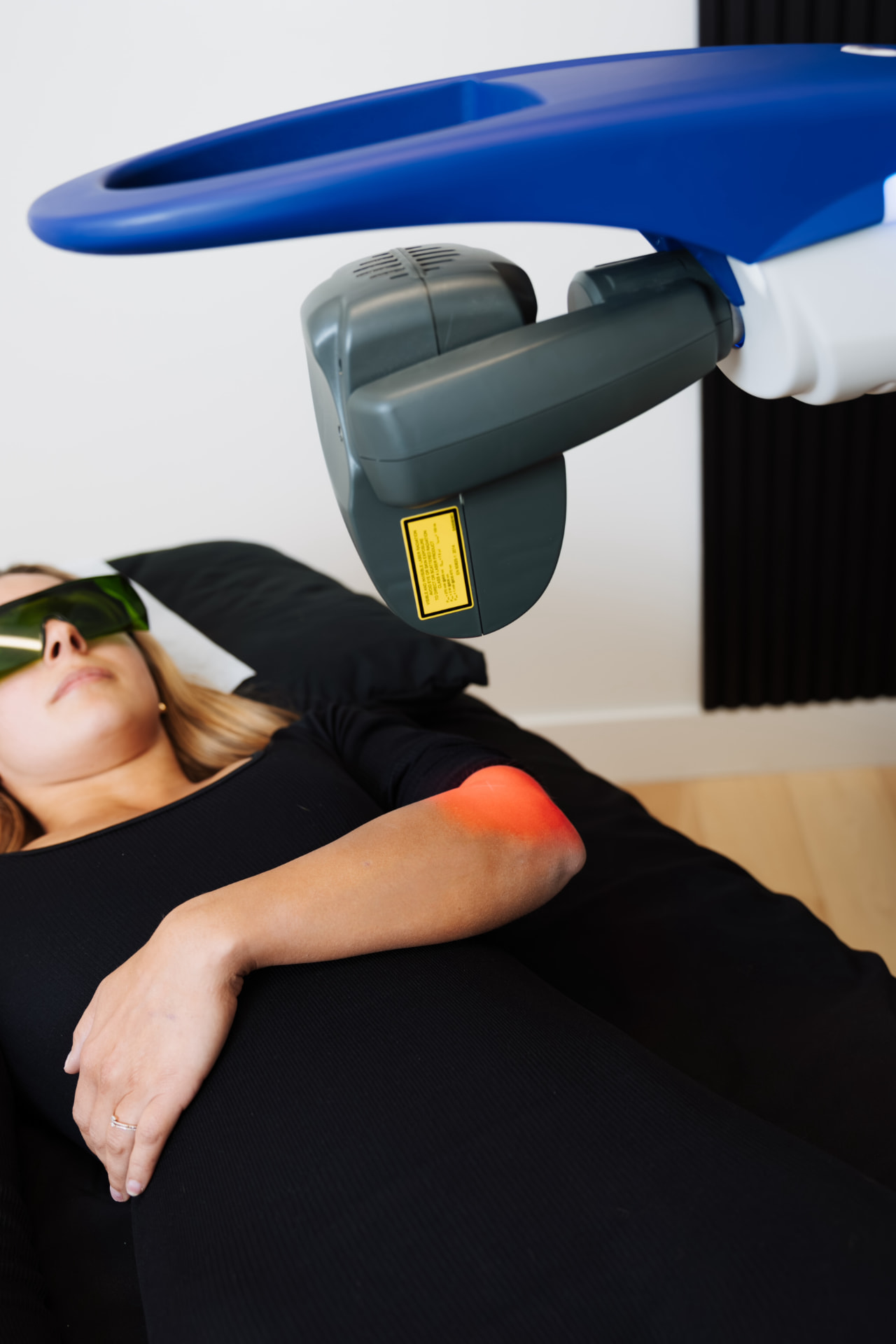 Precision treatment being performed on a client's face with a suction device