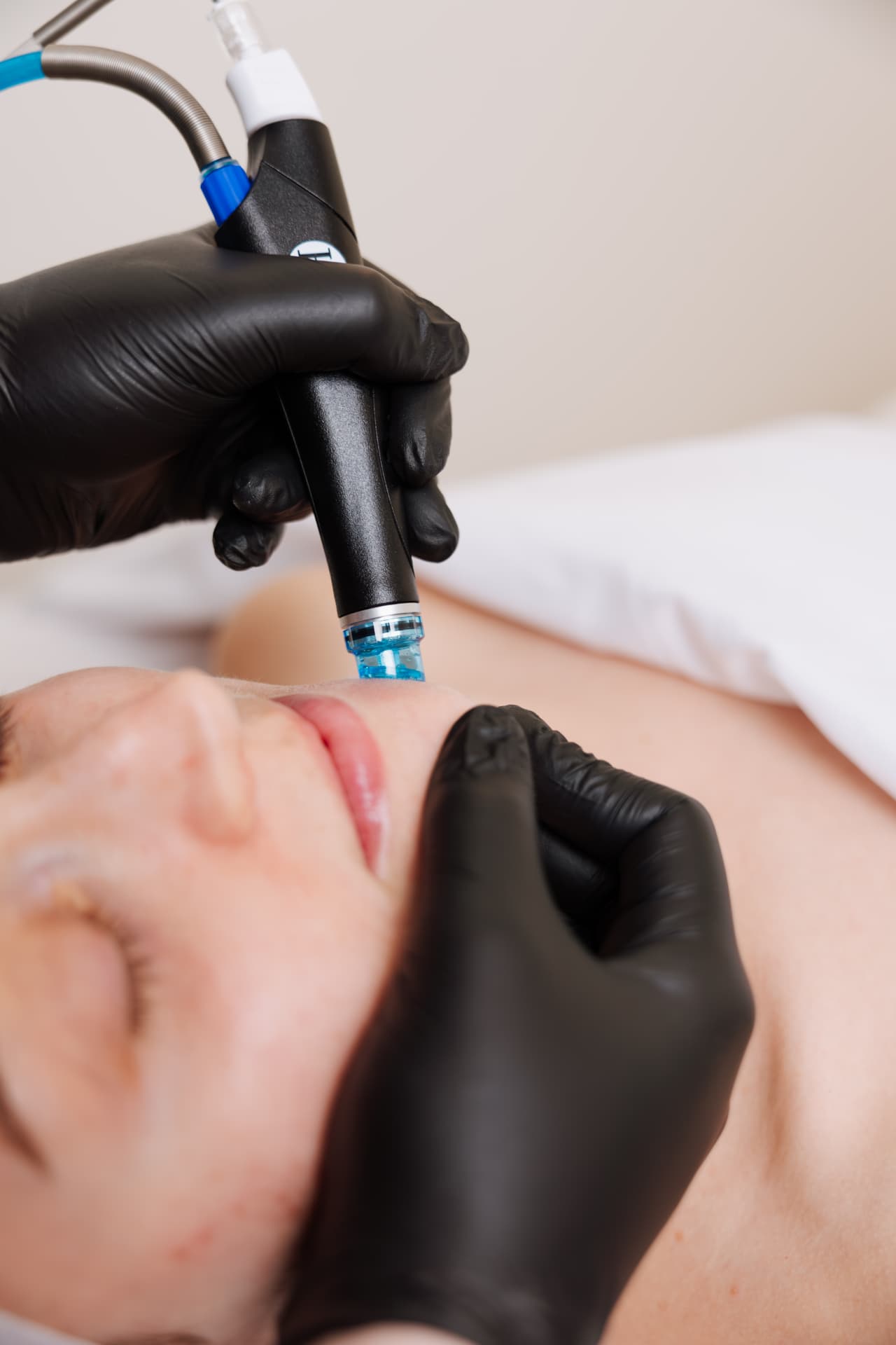 Client receiving a hydrating facial treatment at a medical spa